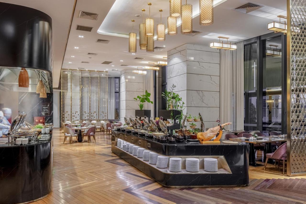 Melia Vinpearl Hue Hotel Bagian luar foto The restaurant