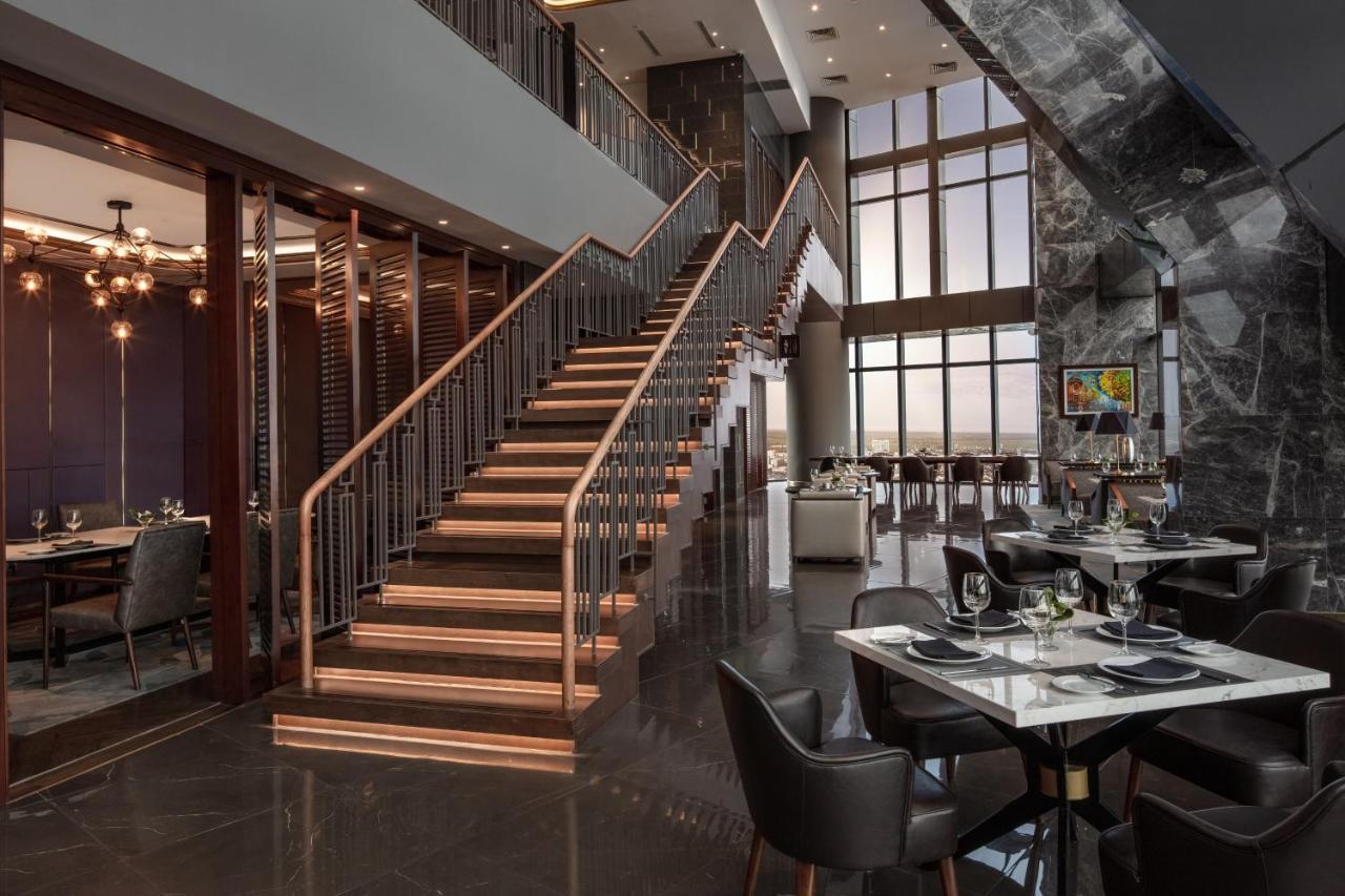 Melia Vinpearl Hue Hotel Bagian luar foto The restaurant's interior