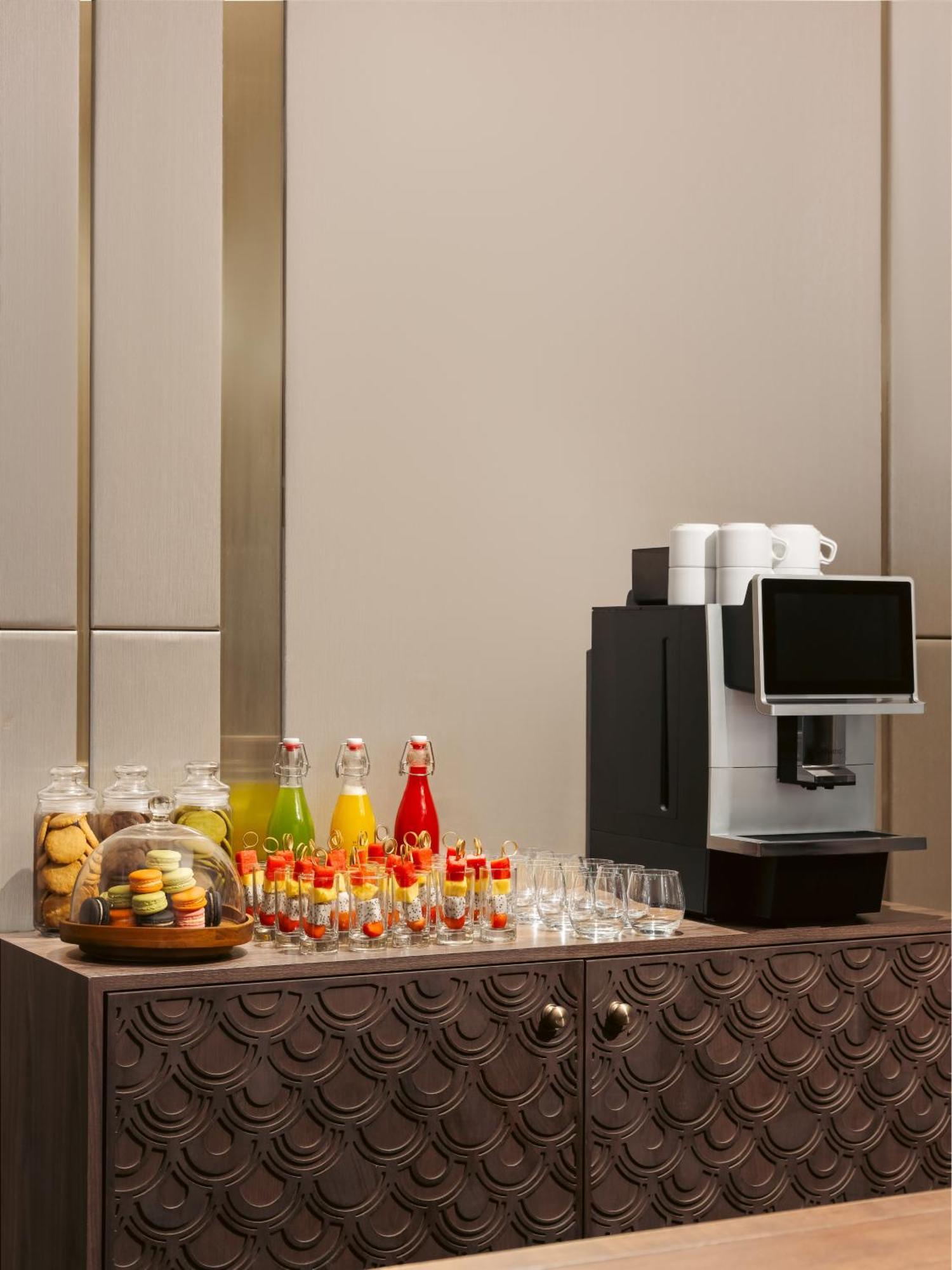 Melia Vinpearl Hue Hotel Bagian luar foto A coffee machine